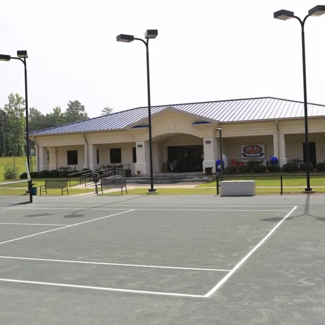 Clay courts and clubhouse at Yarbrough