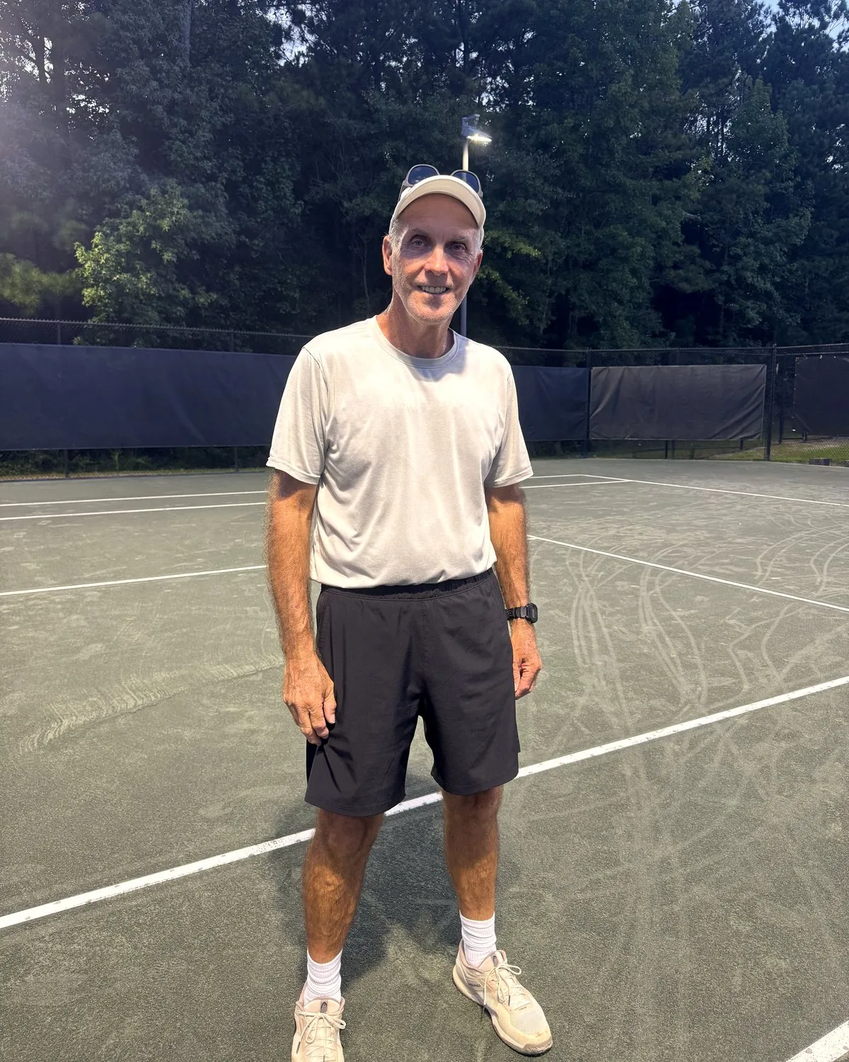 David Hume on a clay court at the Yarbrough Tennis Center