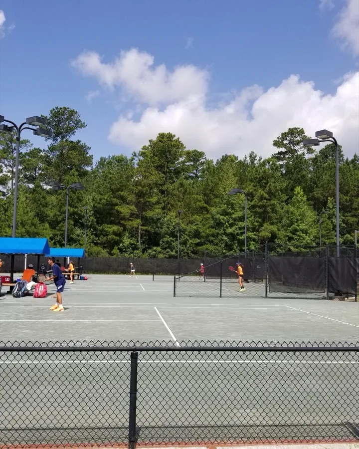 Junior players competing at a USTA event at Yarbrough